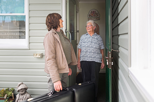 Hayley visiting aged care massage client